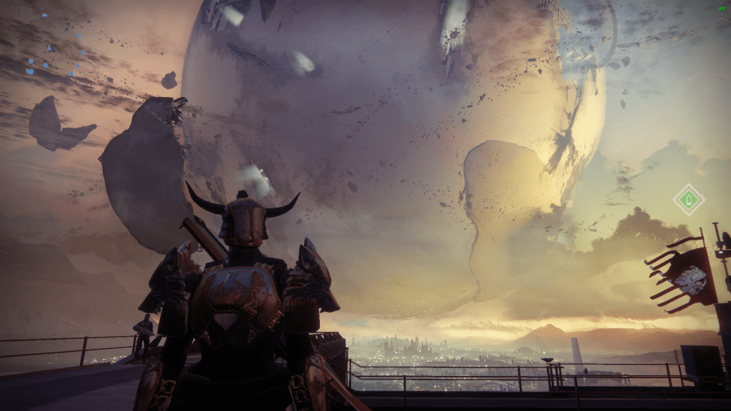 Titan class character in Iron Banner gear standing by the railing at The Tower with the Last City in the background.