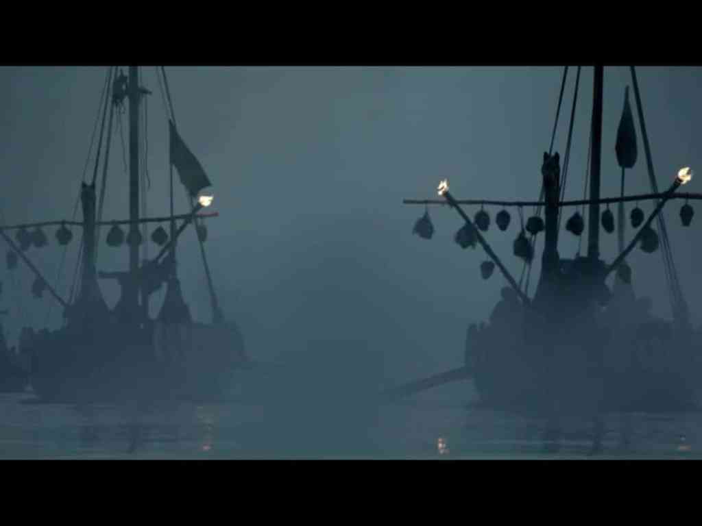 Ragnar Lothbrook crossing a river in England with heads on his boat.