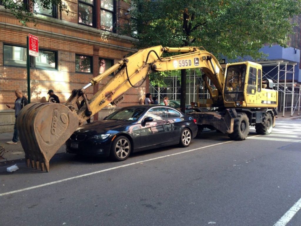 The BMW, before the backhoe dropped.