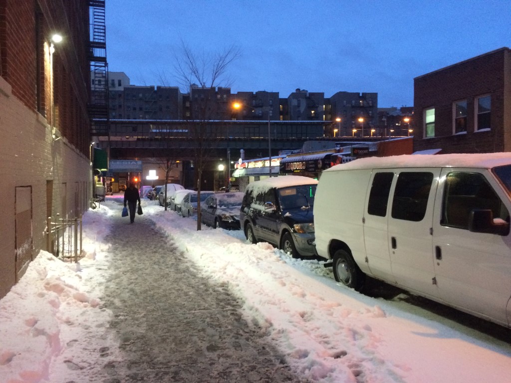 Snow accumulation on 176th Street in the Bronx, New York City.