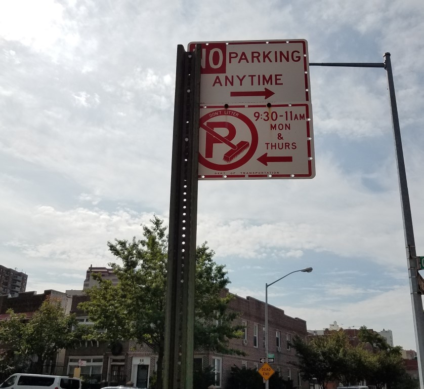 Alternate Side of the Street Cleaning No Parking Sign. No Parking Anytime (right arrow). 9:30 - 11 AM Mon & Thurs (left arrow). Department of Transportation.