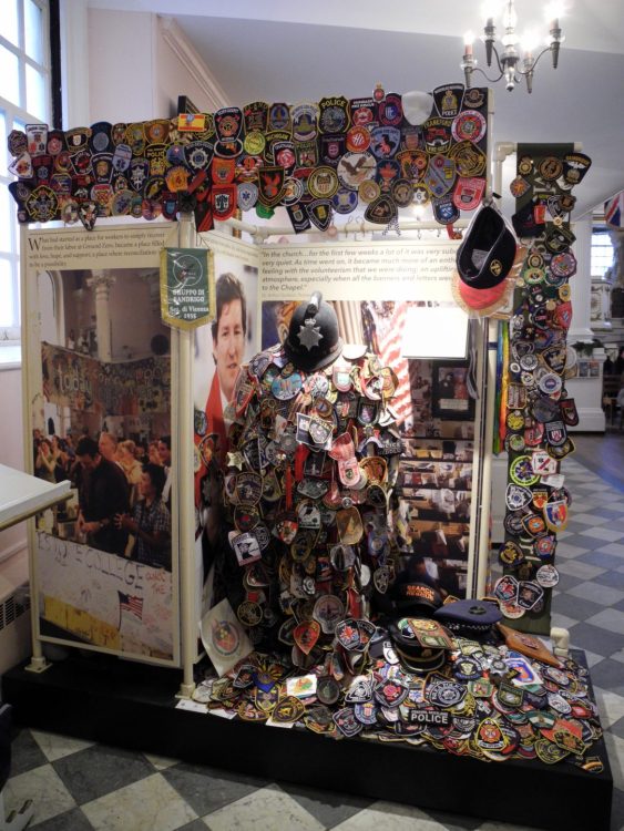 Police and Search and Rescue unit patches left behind as symbols of solidarity
