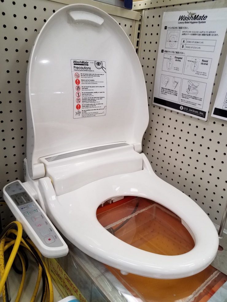 Japanese bidet toilet attachment.